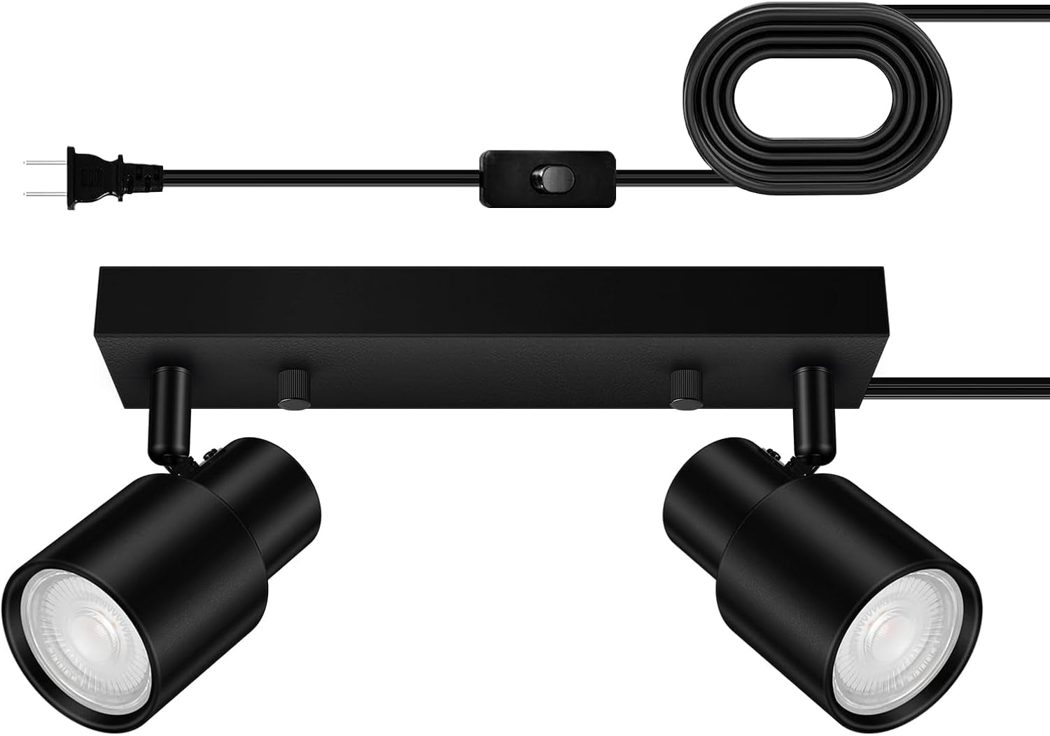 Close-up front view of a black two-head plug-in track light with coiled cord and inline switch.