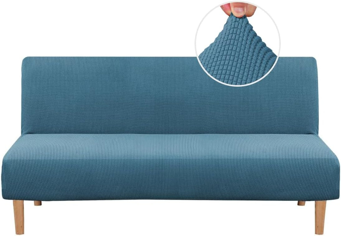 Front view of a blue small-check textured slipcover fitted on a futon with wood legs