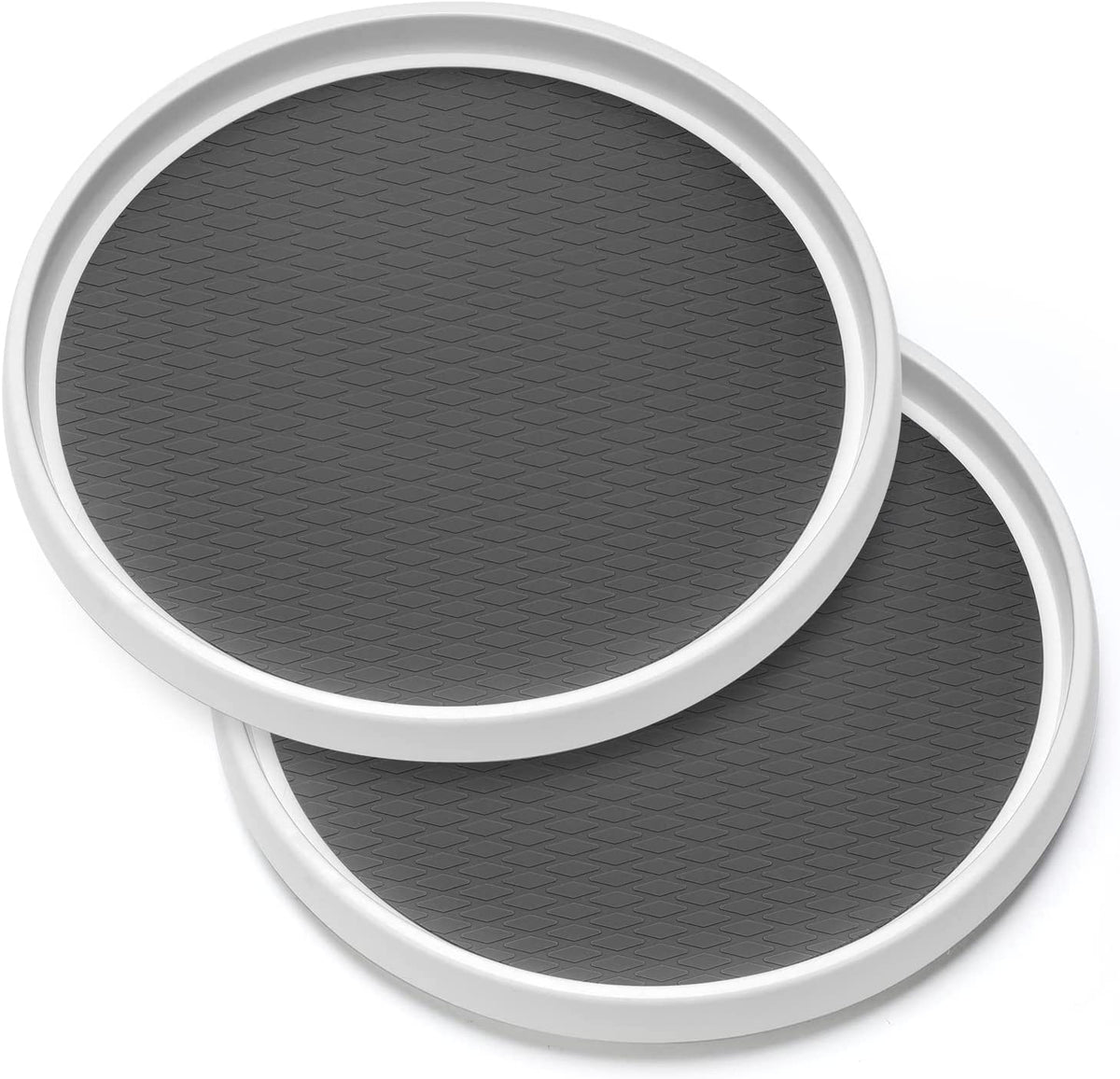 Overlapping top-down view of two round turntables showing diamond-patterned gray non-slip surface