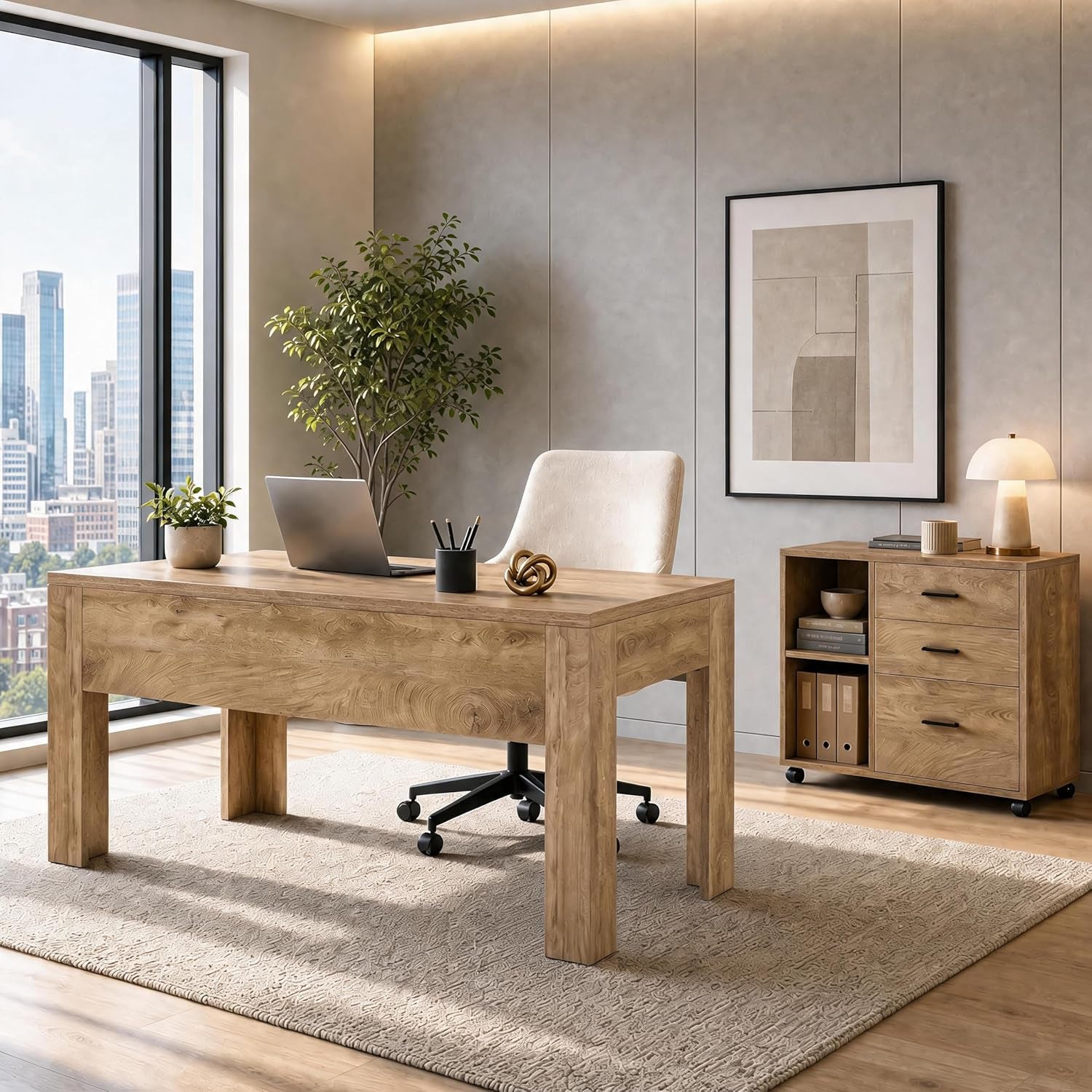 Light wood desk with cream swivel chair and a rolling three-drawer file cabinet beside framed art in a sunlit office.