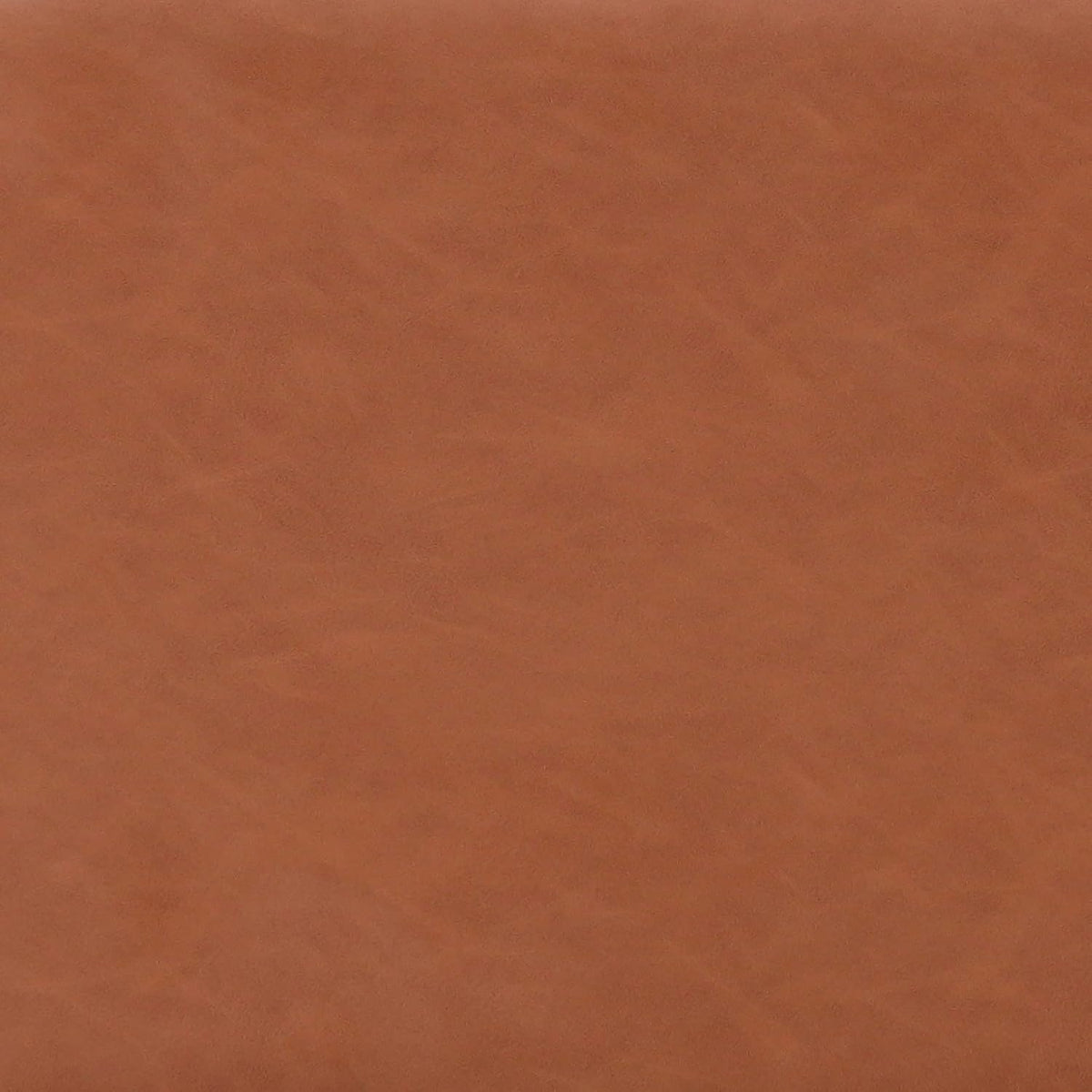 Close fabric swatch showing smooth tan leather-like texture and subtle grain.