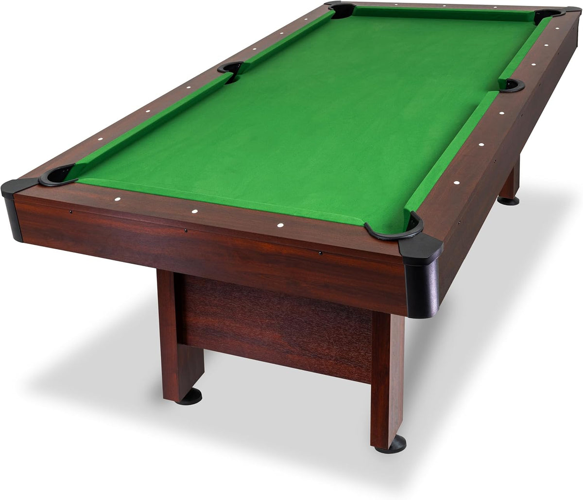 Angled view of a dark wood pool table with bright green felt and black corner pockets.