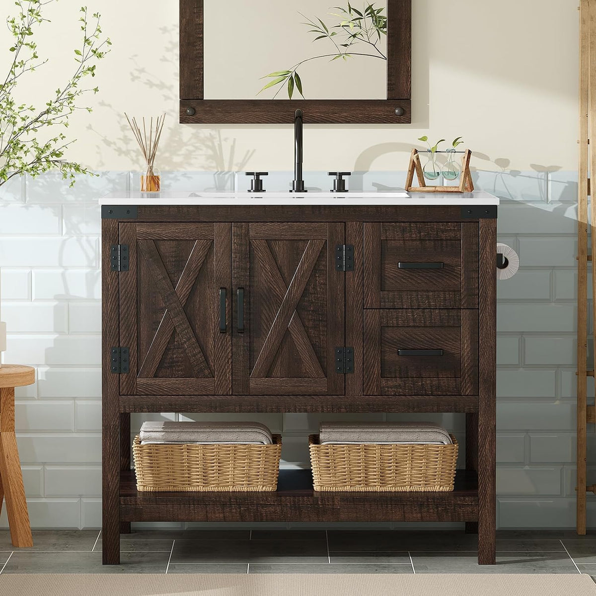 Dark wood single-sink bathroom vanity with X-panel doors, black hardware and open lower shelf with baskets