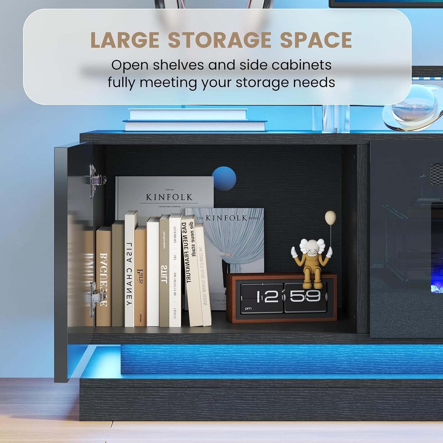 Open side cabinet interior with books on a shelf and a circular cable access hole in the back panel