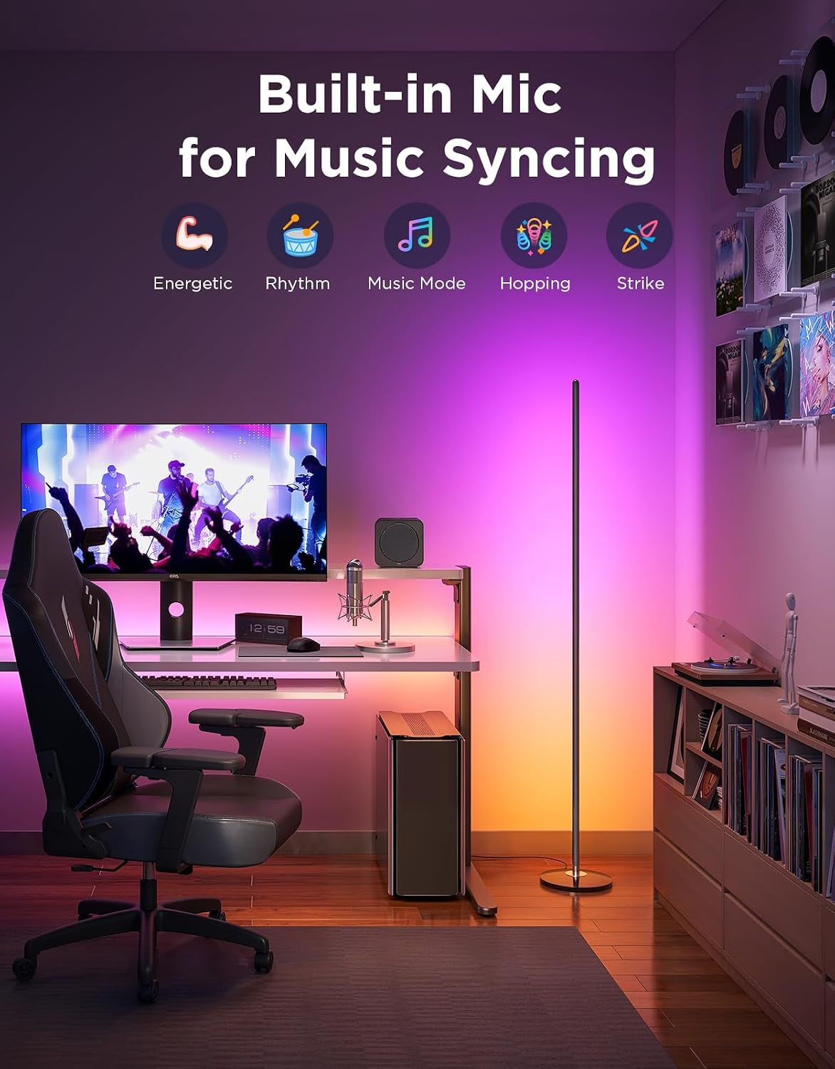 Slim floor lamp beside a gaming desk casting pink and orange backlight with music-sync icons overhead
