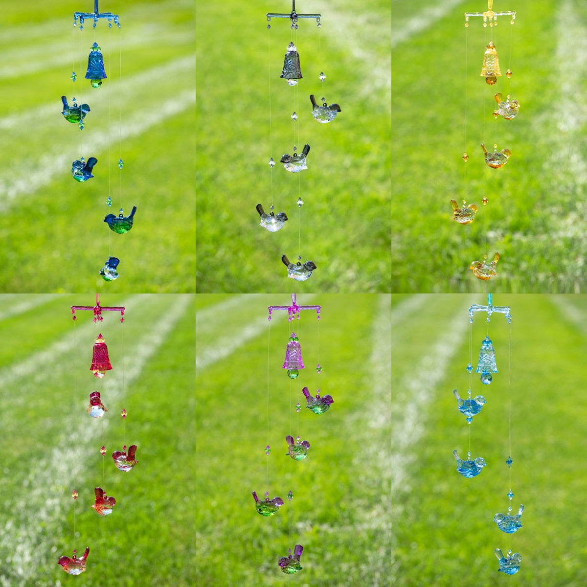Several colorful hanging ornaments, each with a bell and small bird figures, shown against a green background.