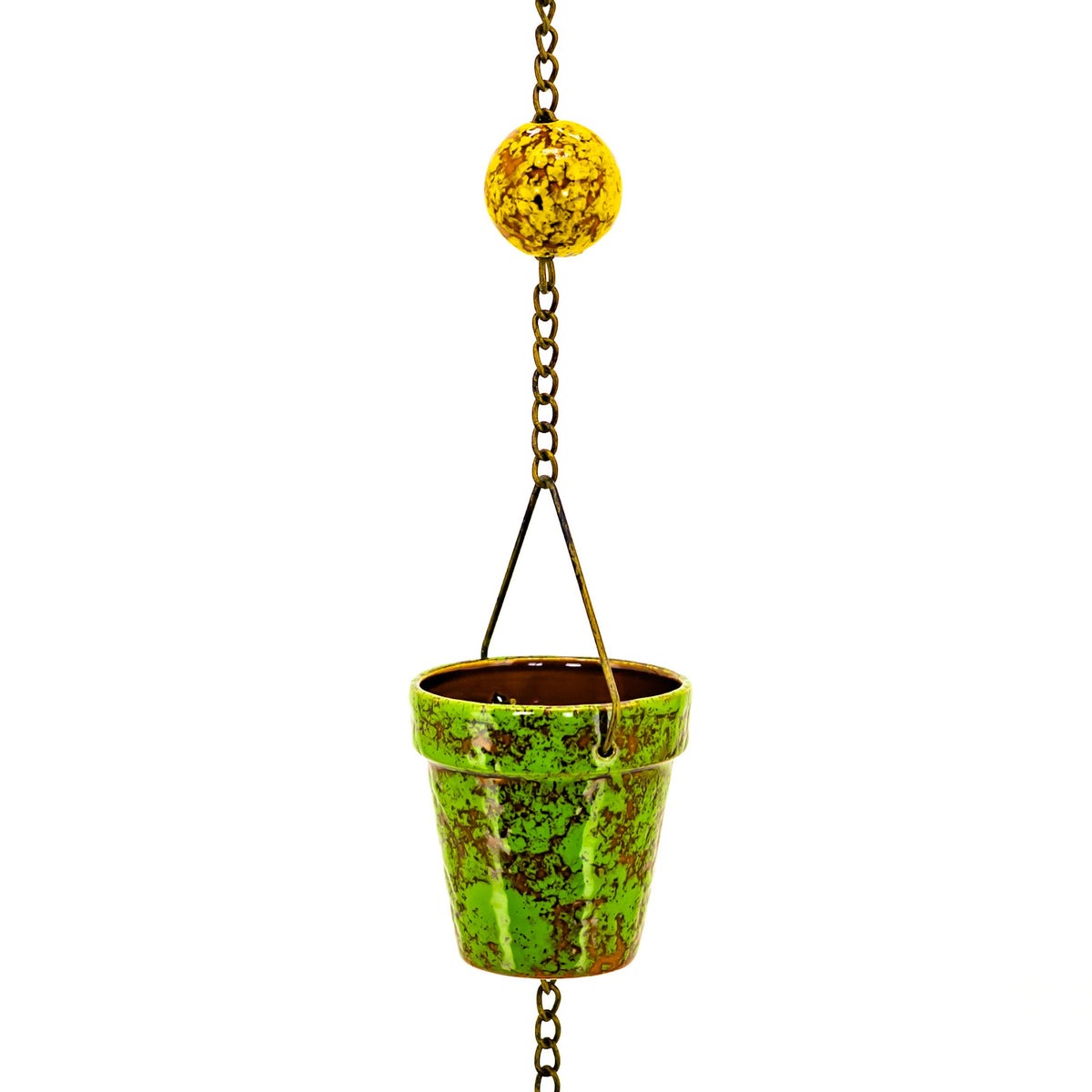 A green mottled bucket-shaped rain chain hangs from a bronze-colored chain with a yellow decorative sphere.