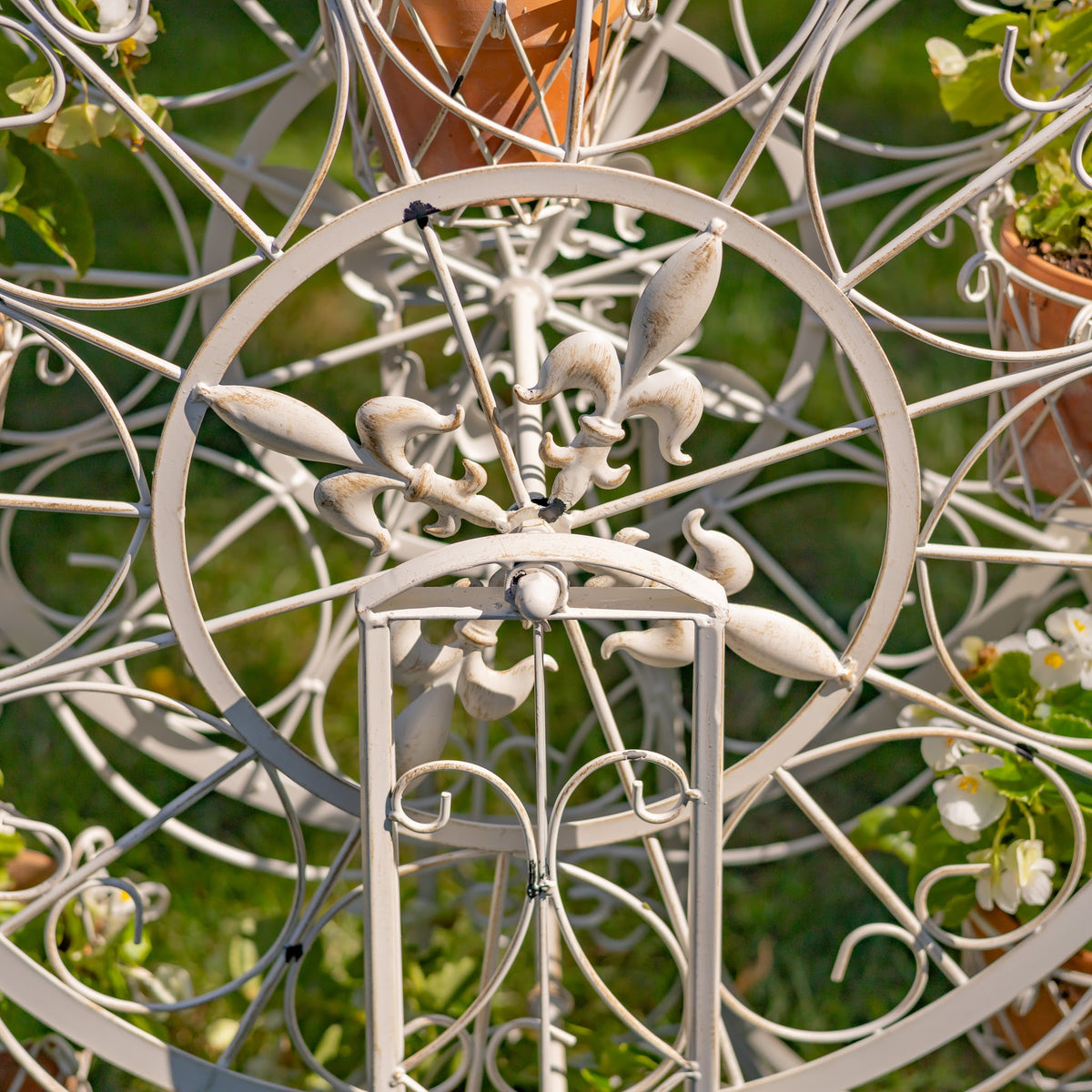 Close-up of the ornate central wheel and iron framework