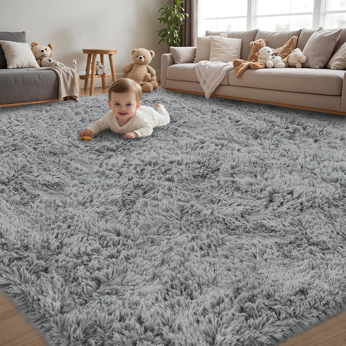 Low-angle view of a plush light gray shag rug filling a living room with a baby crawling near the center.