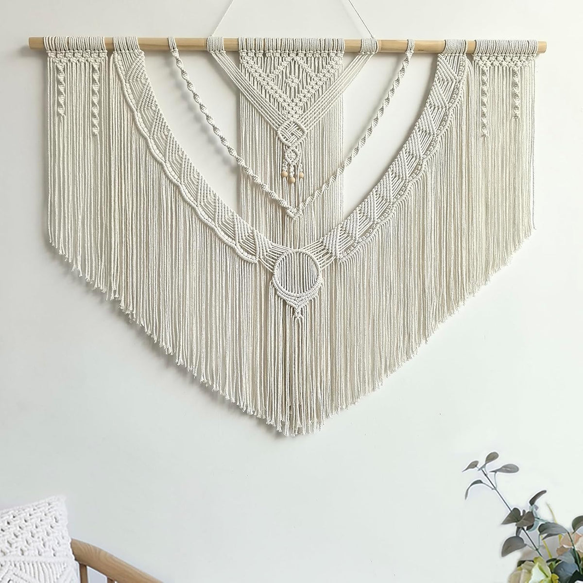 Front detail highlighting a circular macramé ring motif at the center with layered cords above it.