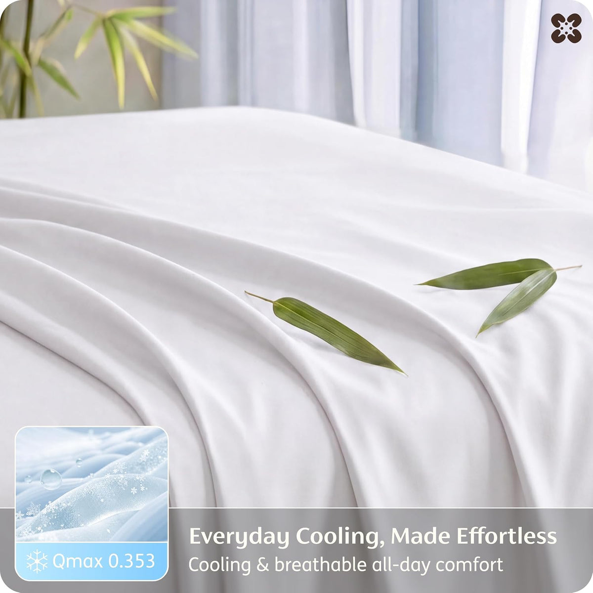 Smooth white fitted sheet and pillowcases on a neatly made bed in a staged bedroom