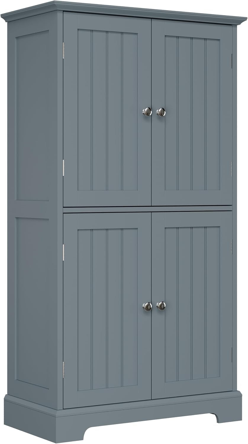 Three-quarter view of a tall storage cabinet with beadboard doors and chrome knobs in muted blue-gray.