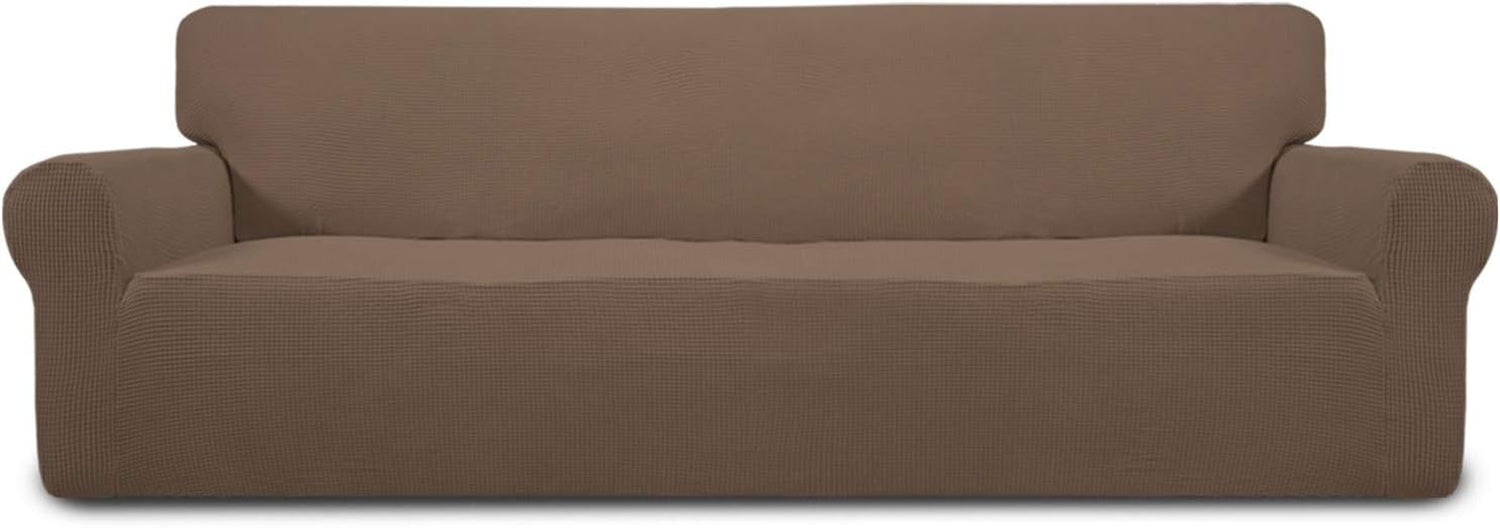 Low front-facing studio view of a brown-covered loveseat showing a slight seat crease and shadow underneath.