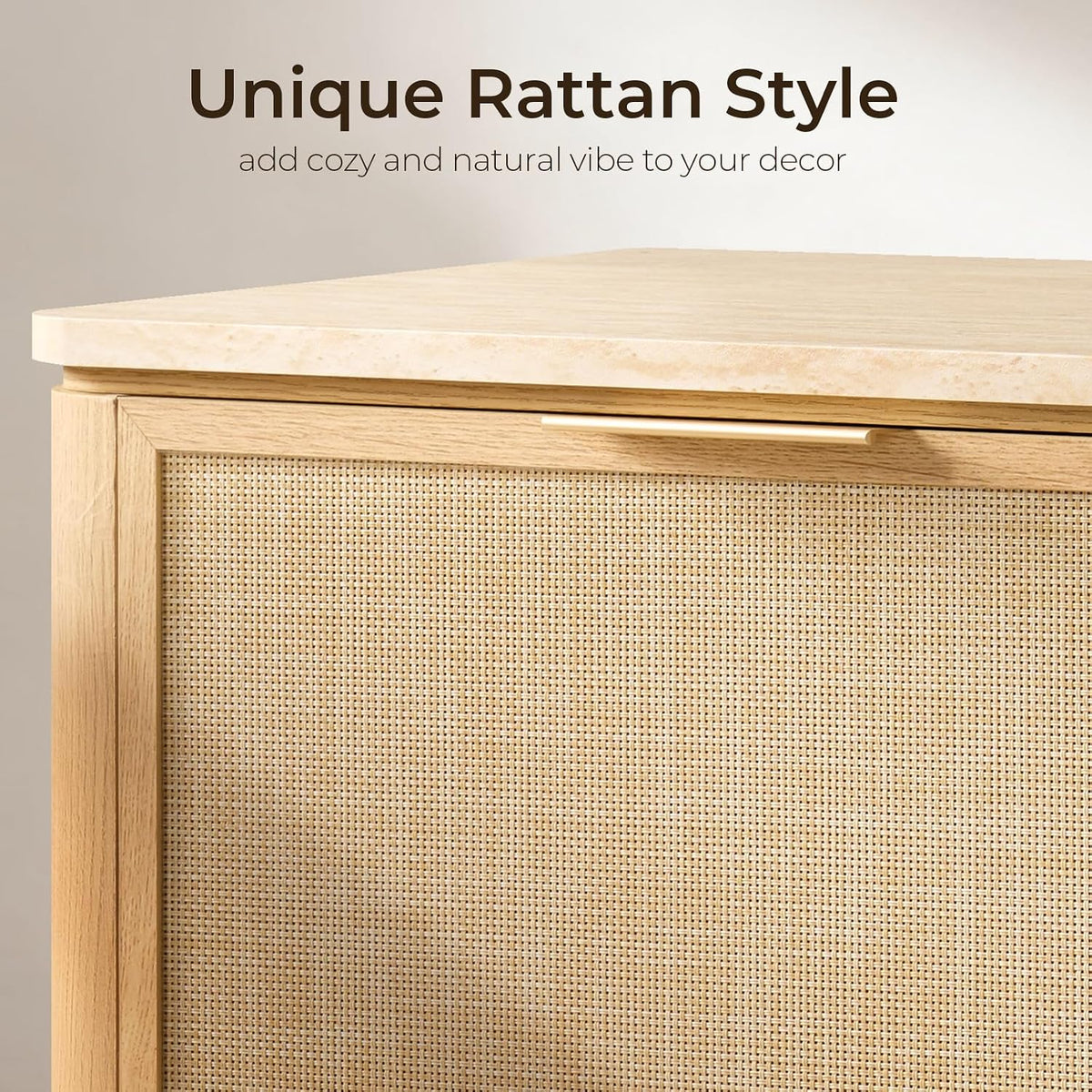 Close-up of hand-woven rattan-look drawer front, slim champagne-gold metal handle, and faux travertine top edge