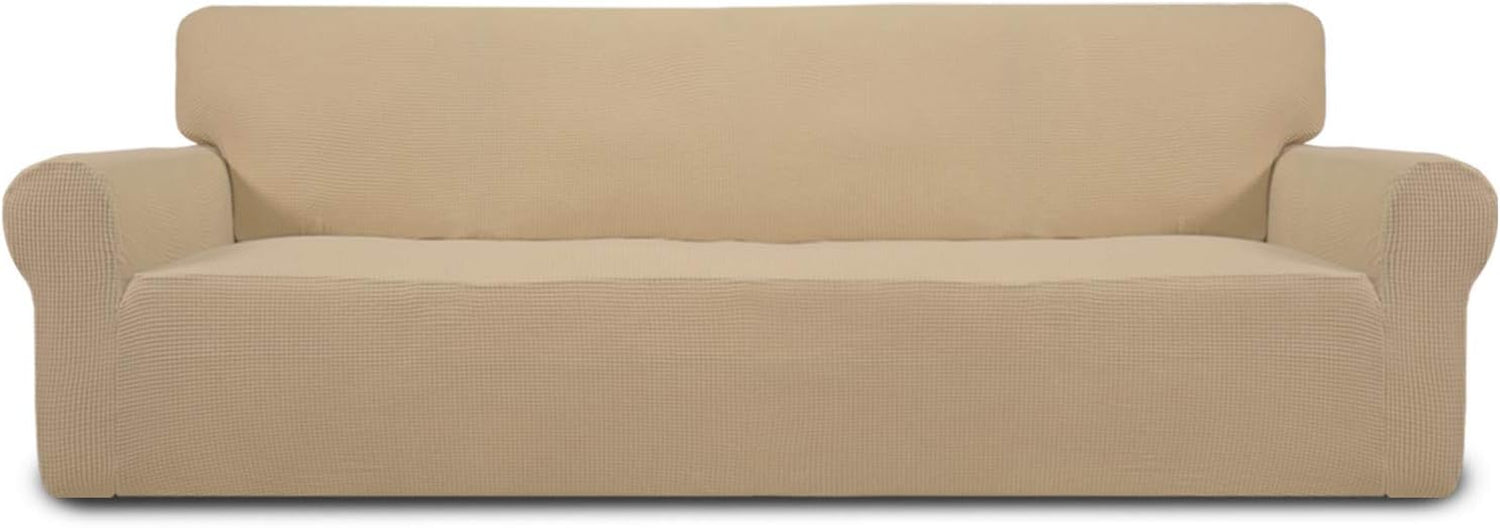 Front-facing two-seat loveseat fully covered in a smooth tan textured slipcover on white background