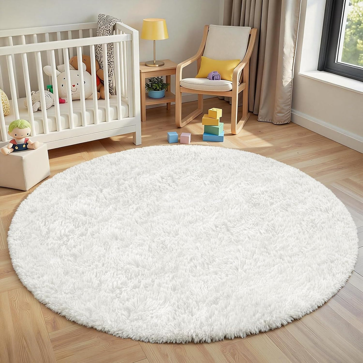 Round white fluffy shag rug on light wood floor in a child's nursery with crib and chair