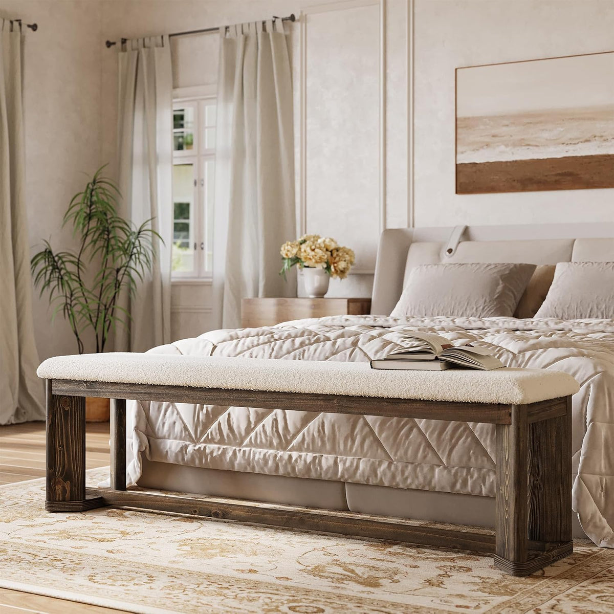 End-of-bed bench with white faux lamb fur seat and rustic solid wood frame in a bedroom setting