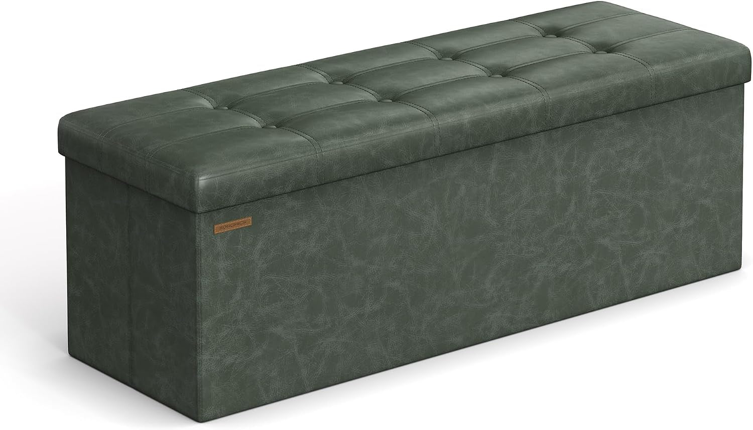 Deep green tufted faux-leather folding storage bench shown at an angle on a white background.