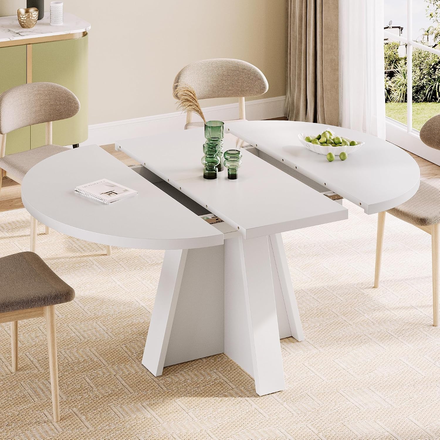 White version of the round table partially extended, showing the center extension panel and guides.