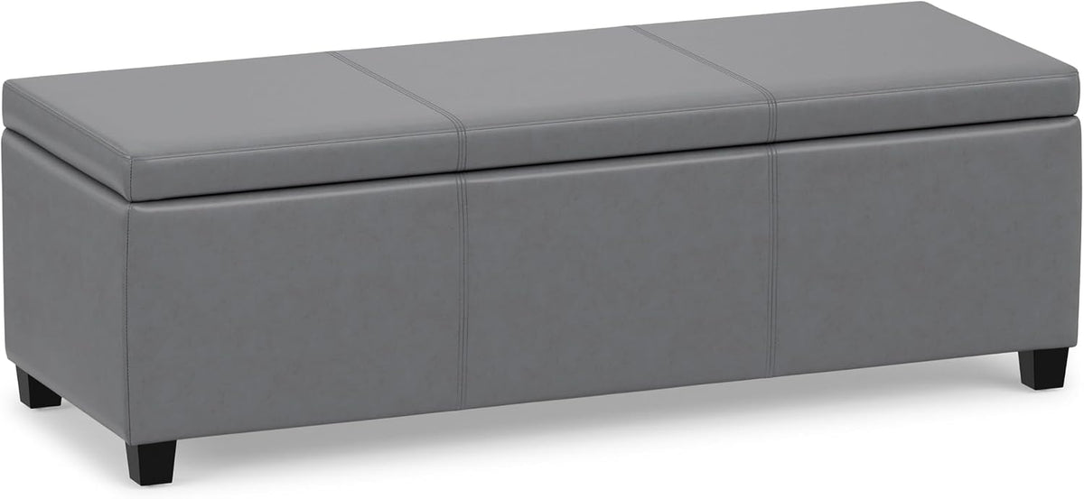Slate grey rectangular lift-top storage ottoman shown at a slight angle on white background.