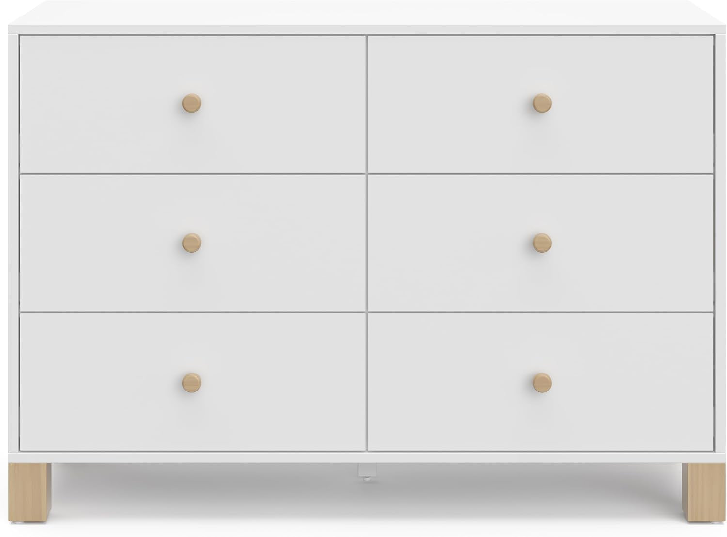 Straight-on front view of a white dresser showing six aligned drawers and round light wood knobs.