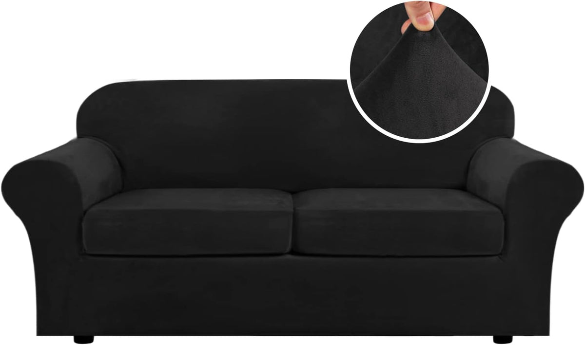 Front view of a three-seat sofa dressed in a black stretch velvet slipcover with an inset showing the plush fabric held
