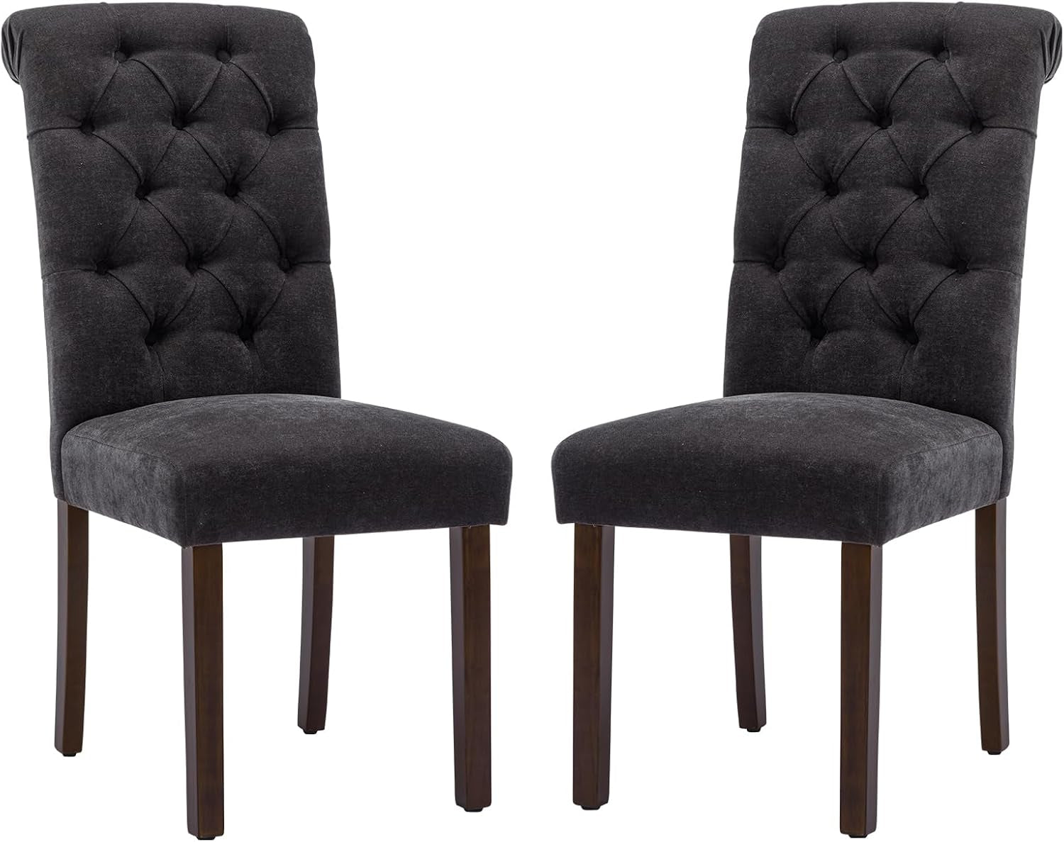 Close frontal view of two charcoal tufted dining chairs showing seat and legs
