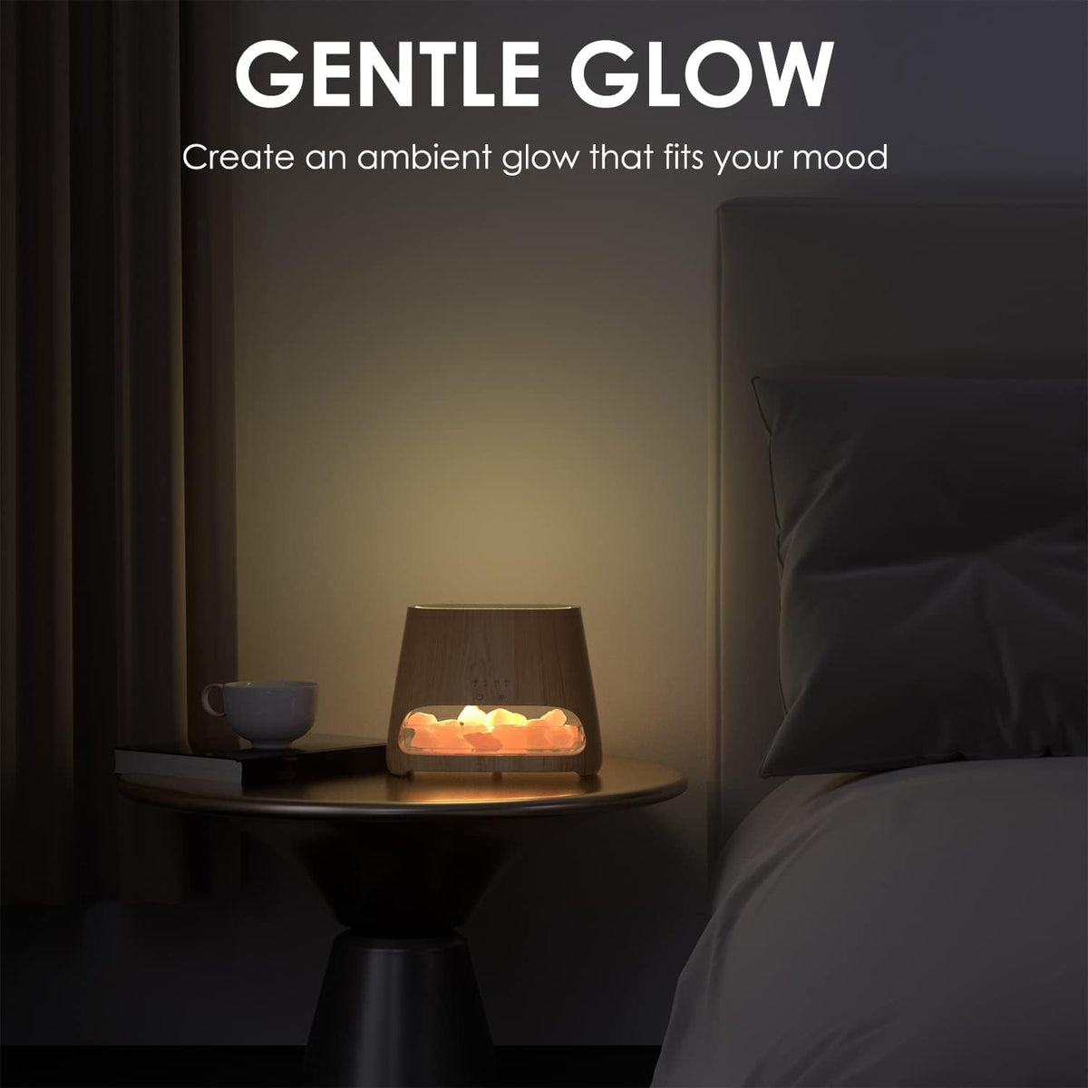 Diffuser lit on a bedside table emitting a warm ambient glow in a dim bedroom setting