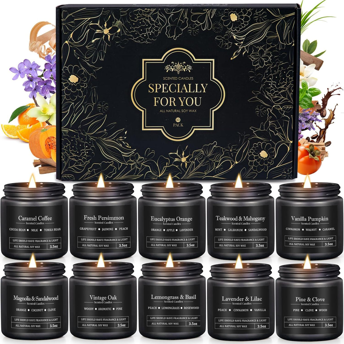 Twelve black jar candles displayed in front of a black floral gift box with several candles shown burning and fruit/herb