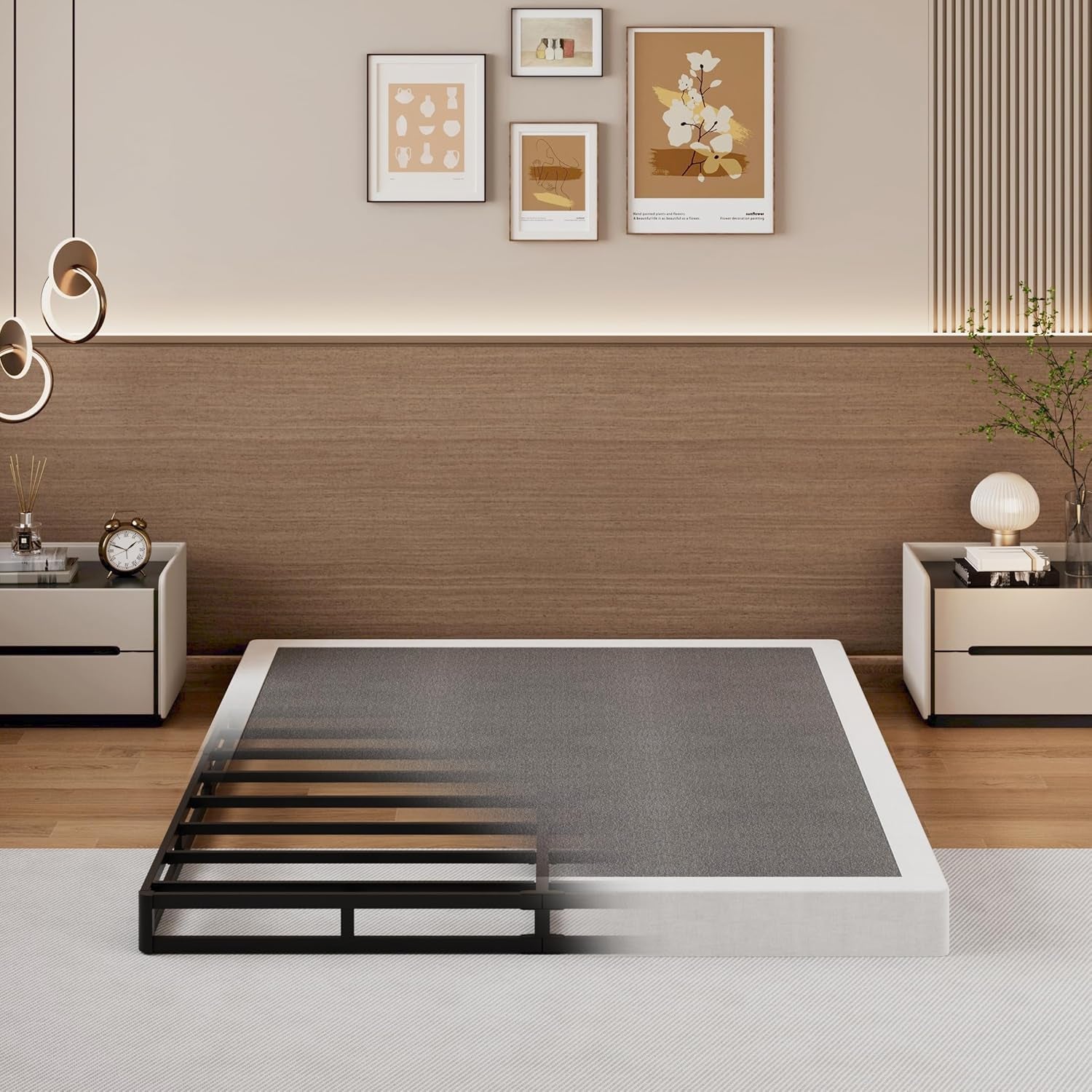 Low-profile metal slatted frame installed in a modern bedroom with nightstands, wall art, and wood accent wall.