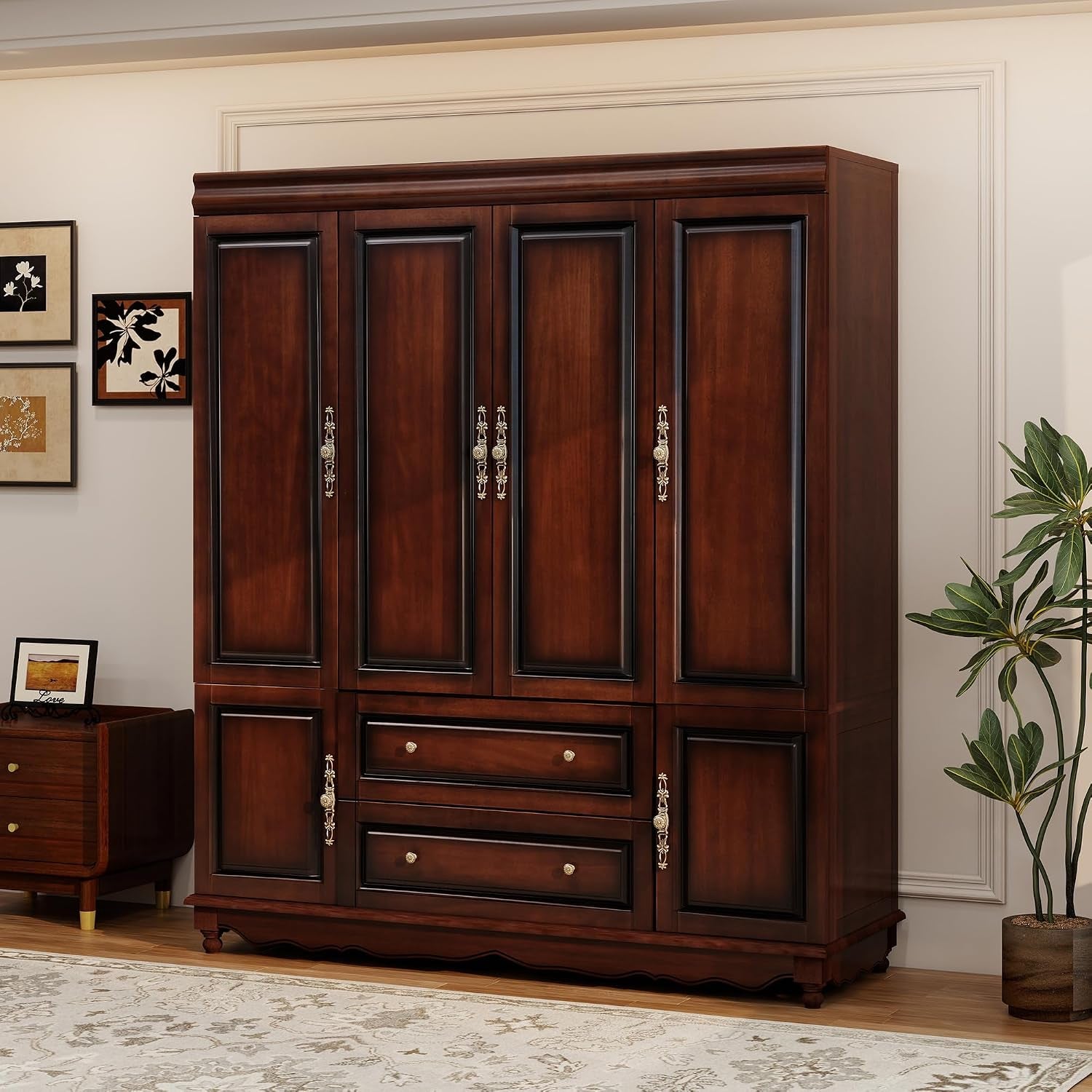 Closed cherry finish wardrobe armoire angled left view in a bedroom setting with decorative plant nearby