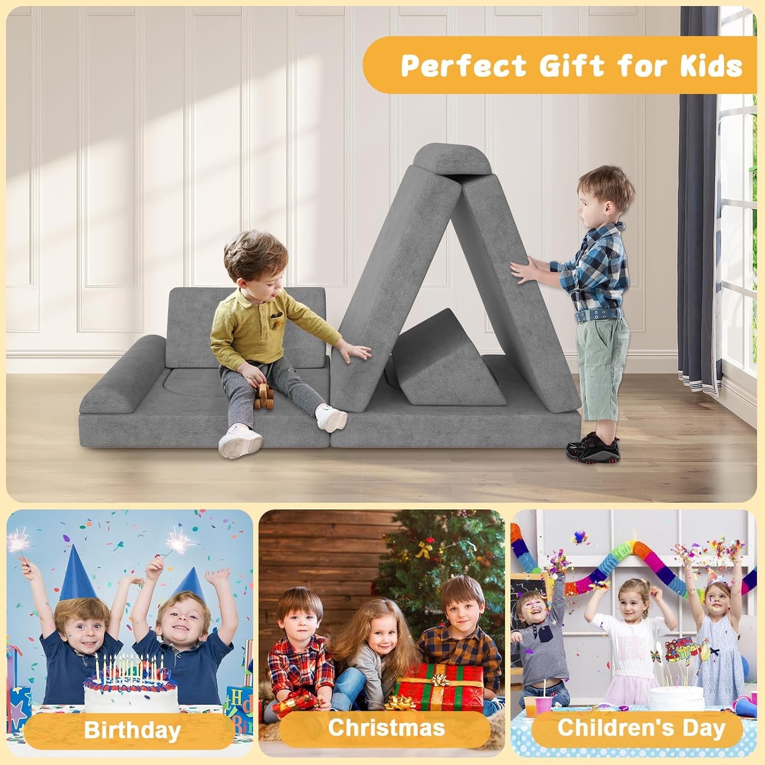 Two toddlers stack and arrange gray foam modules into a tent-like triangle while one sits on a flat couch piece.