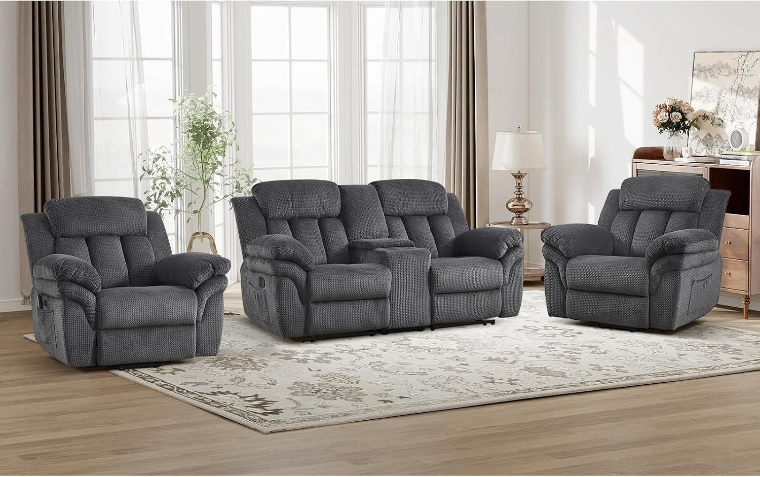 Dark gray reclining trio: two single recliners flank a two-seat reclining loveseat with cupholder console.
