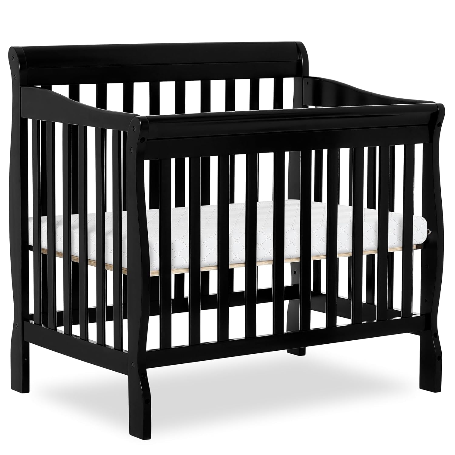 Black mini crib shown on white background featuring curved headboard and slatted sides.