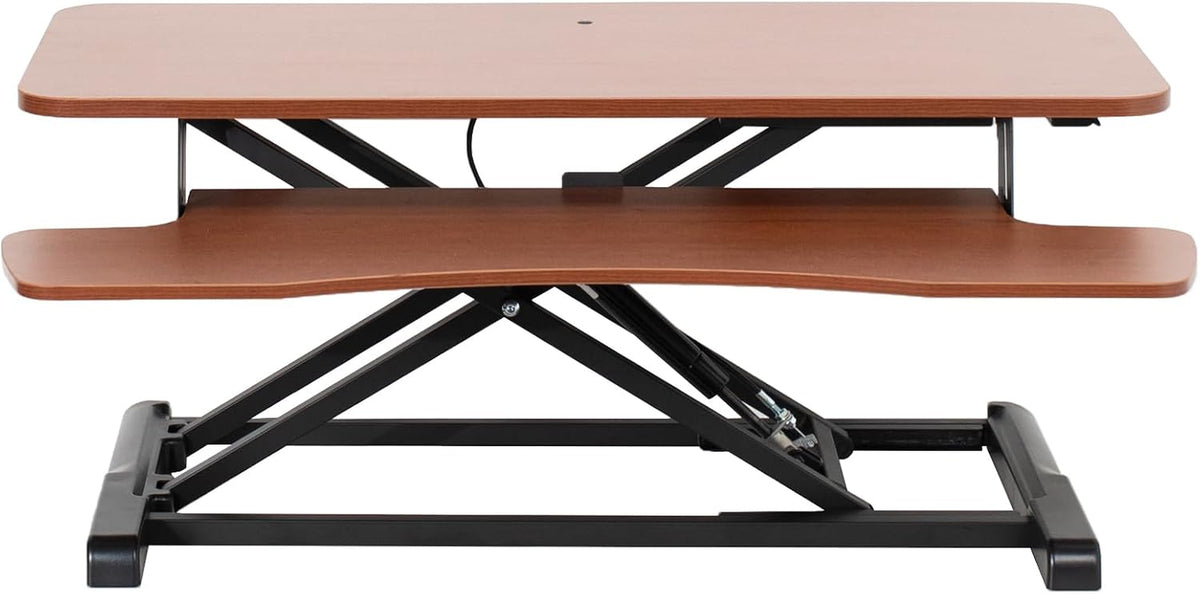 Front view of the desk converter in a lighter brown wood finish with black metal base