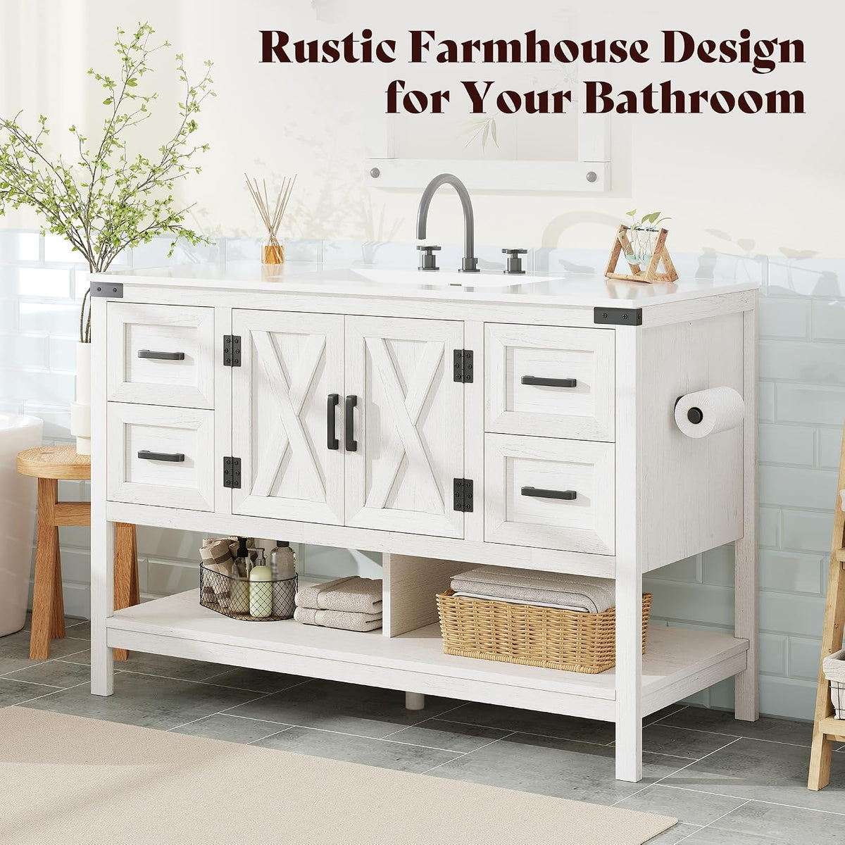 Front view of the white farmhouse vanity under a mirror with faucet, towels and baskets on the lower open shelf in a tiled