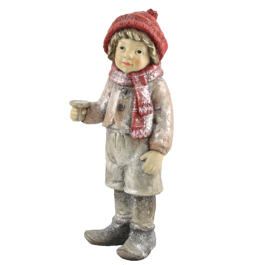 Full view of the red-clad Christmas figure holding a candle holder