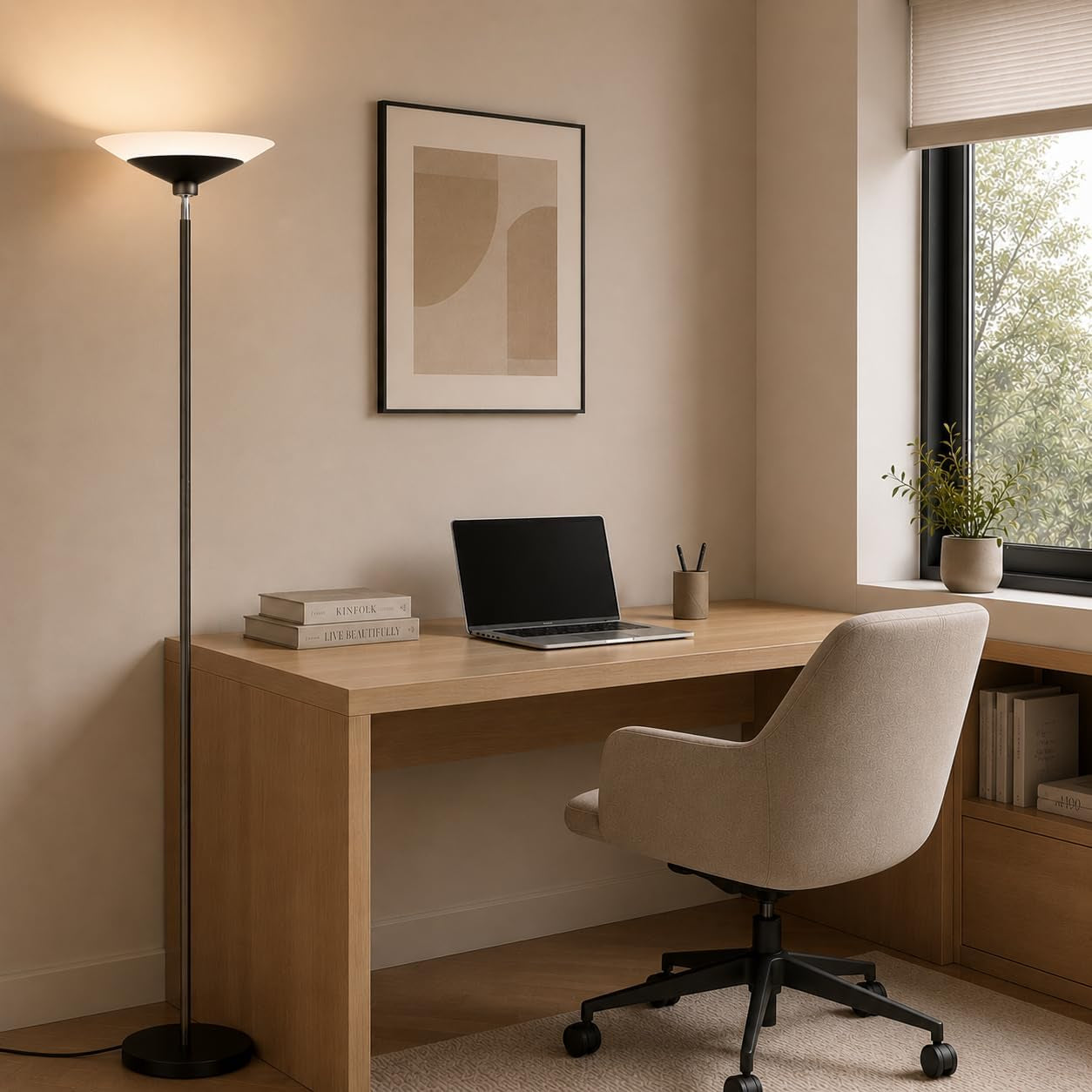 Floor lamp beside a wooden desk and upholstered swivel chair in a sunlit home office.