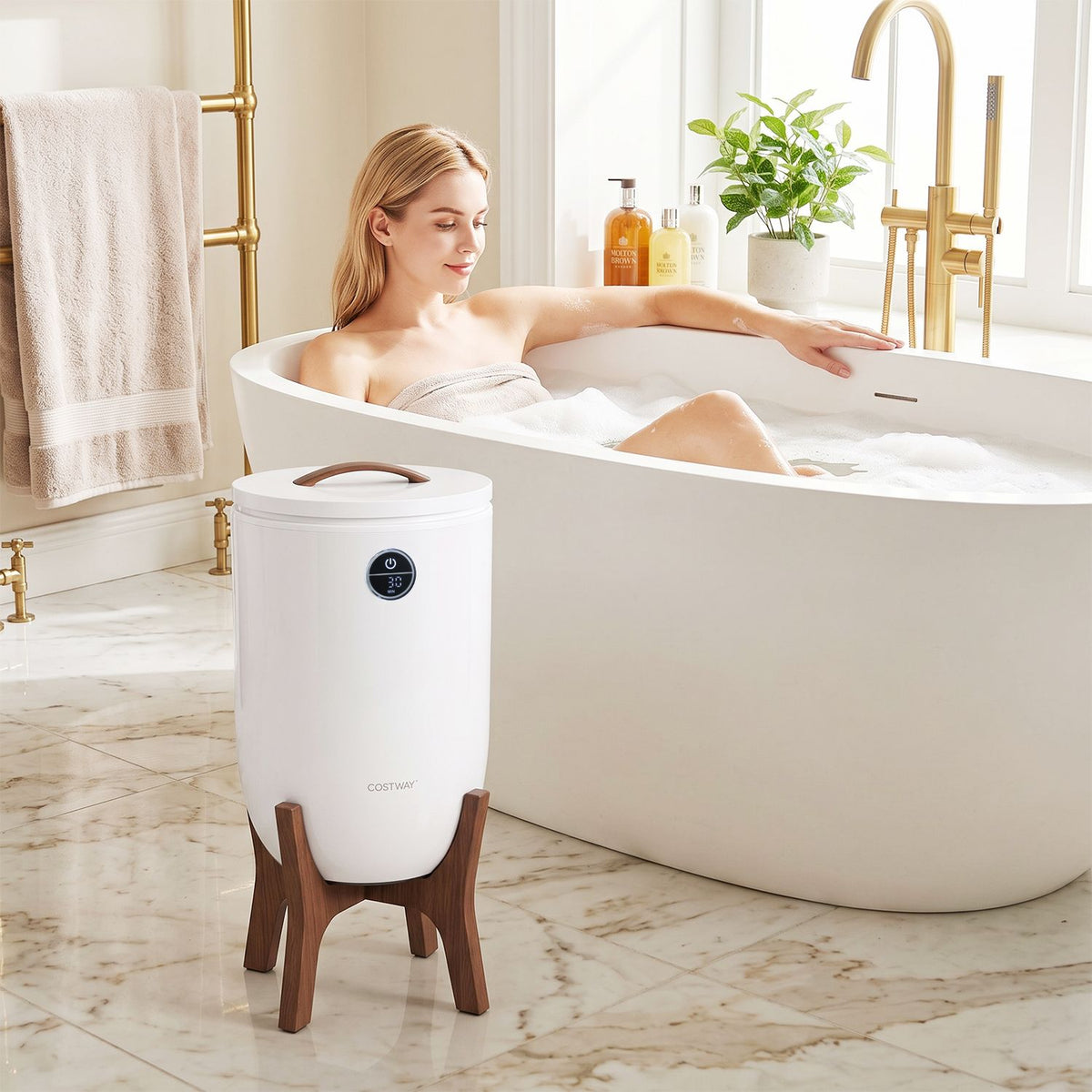 White towel warmer on a wooden stand beside a bathtub in a bright bathroom.
