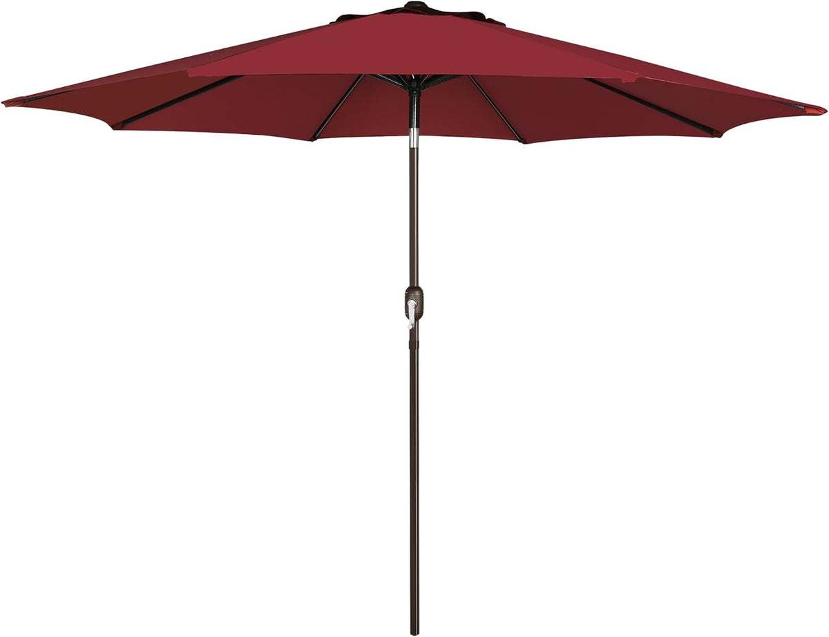 Dark red/burgundy patio umbrella open with brown pole and crank