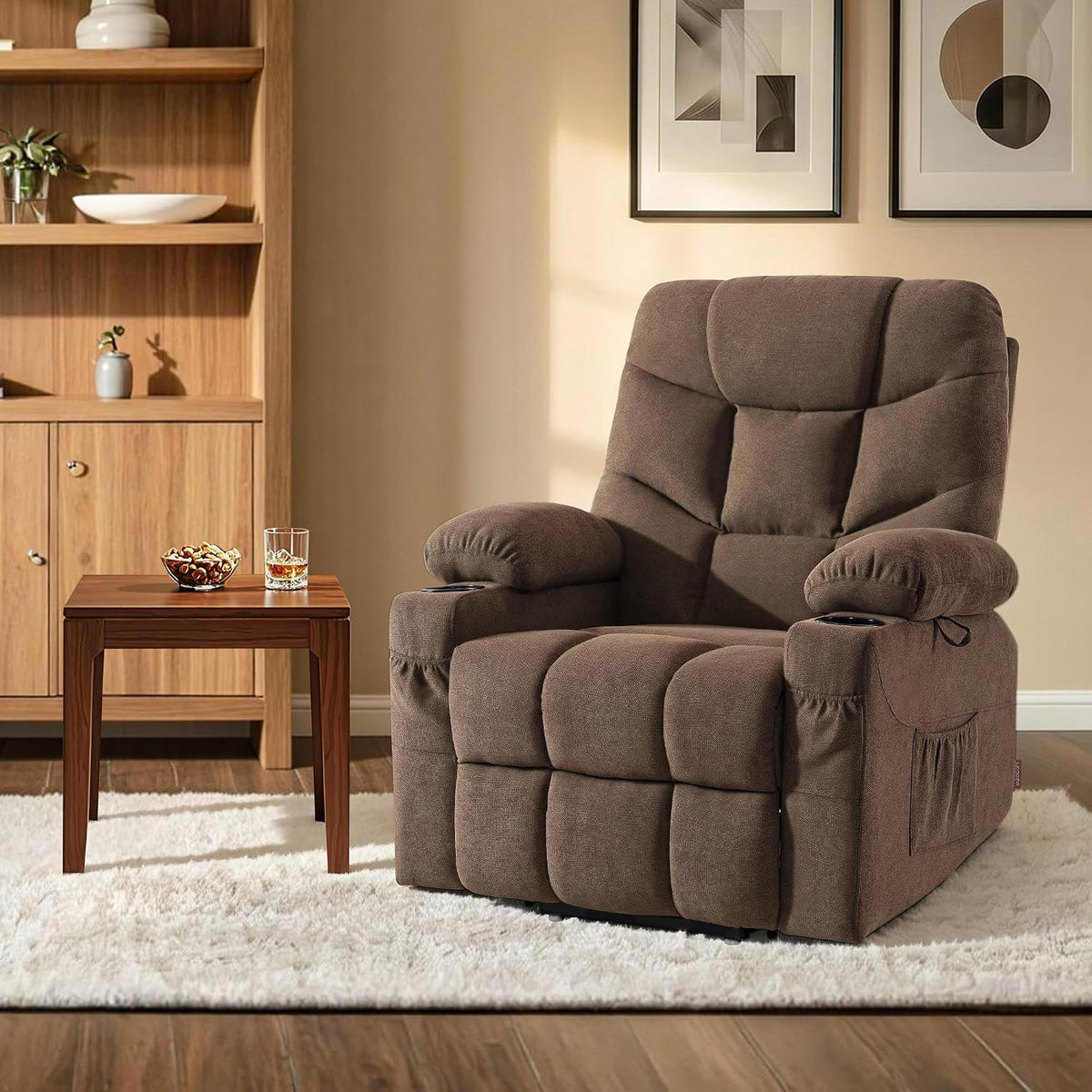 Brown fabric recliner angled front view beside a wooden side table and rug in a staged living room