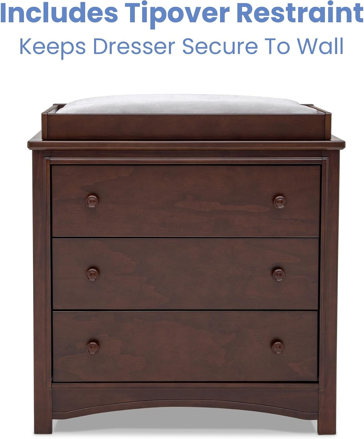 Front view of the dresser with a changing pad in a tray on top and a gently curved apron at the base.