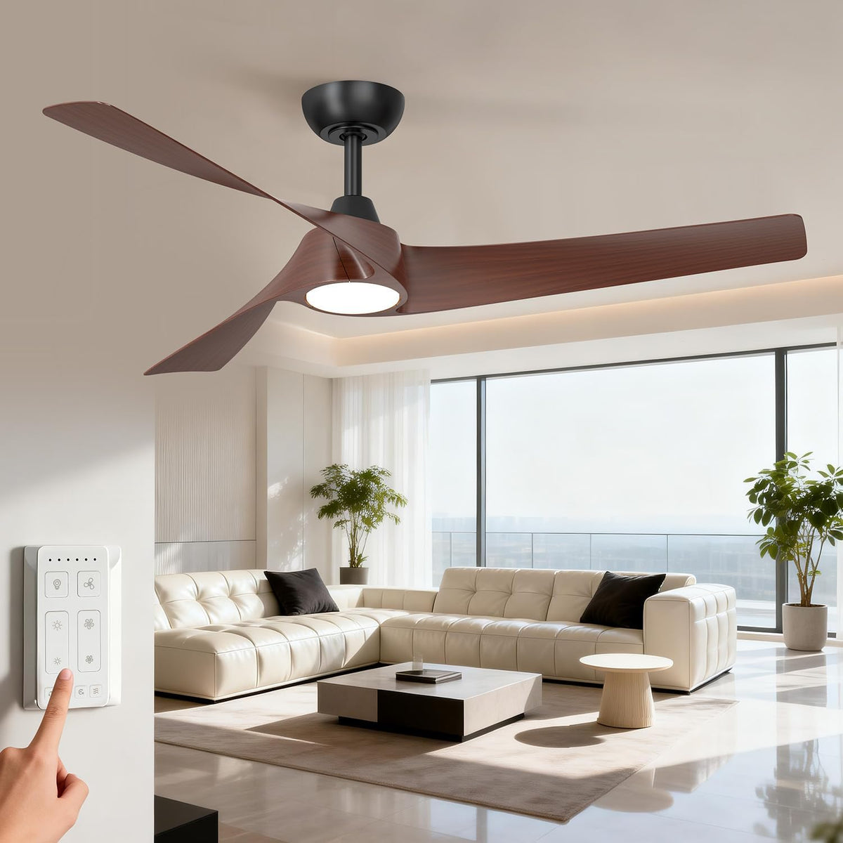 Dark walnut 3-blade ceiling fan angled front view in a bright living room with wall remote being touched.