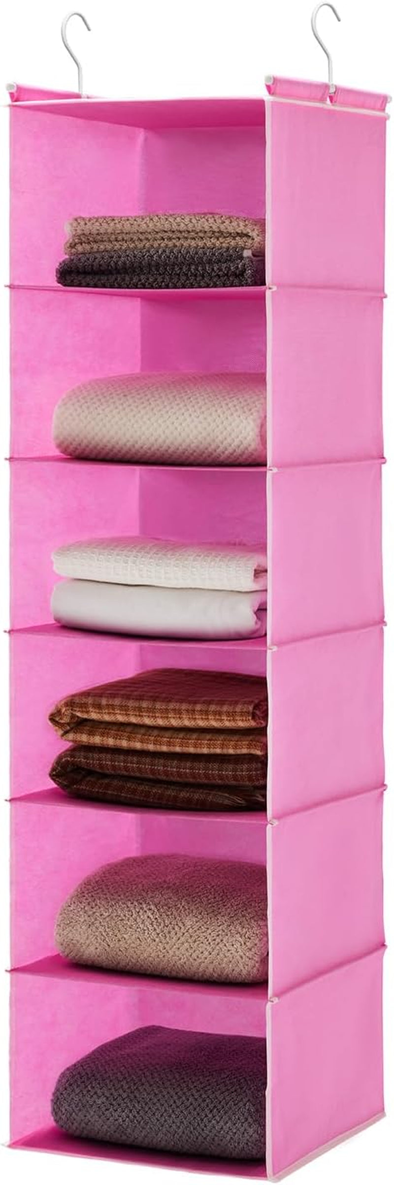 Single bright pink six-tier hanging organizer filled with folded sweaters on each shelf.