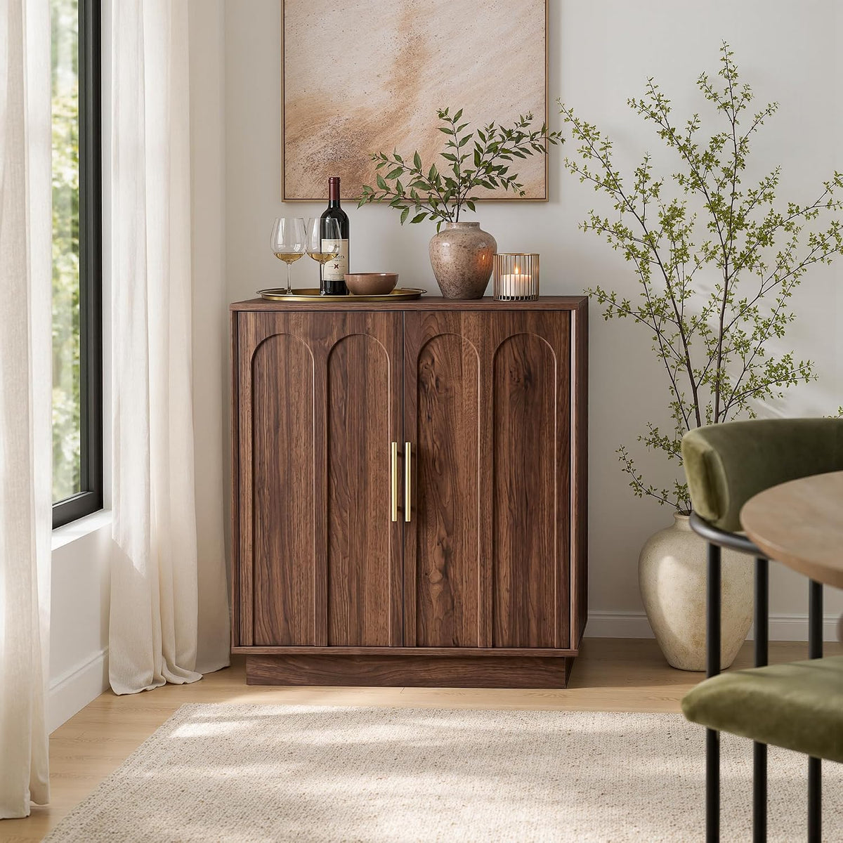 Walnut wine bar cabinet in a dining nook with decorative vase and nearby green dining chair, front view