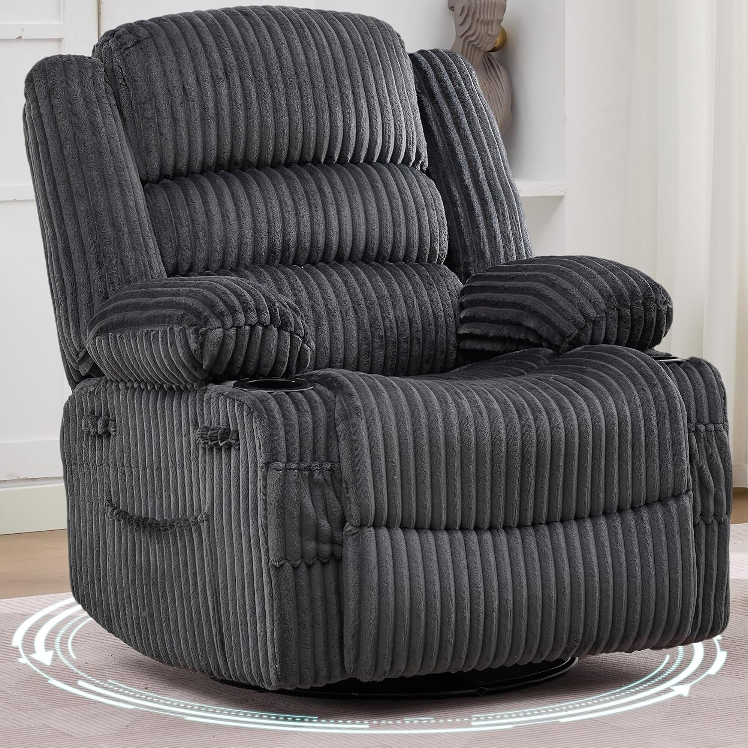 Close three-quarter view of dark gray corduroy recliner showing padded arms, cup holder, and swivel base