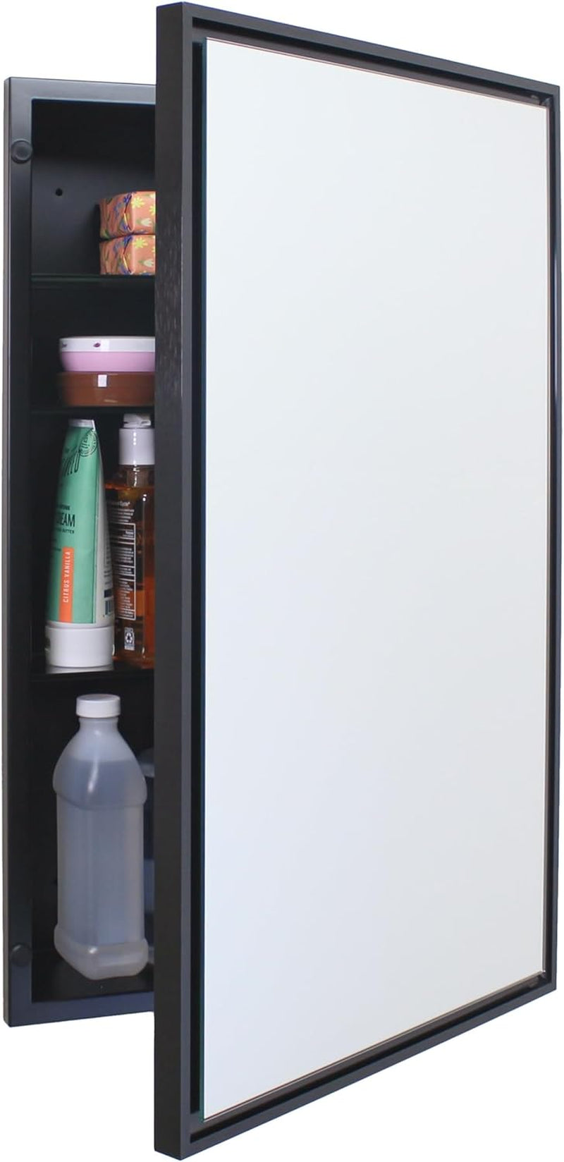 Black-framed recessed mirror opened to reveal dark interior with bottles and stacked boxes on shelves