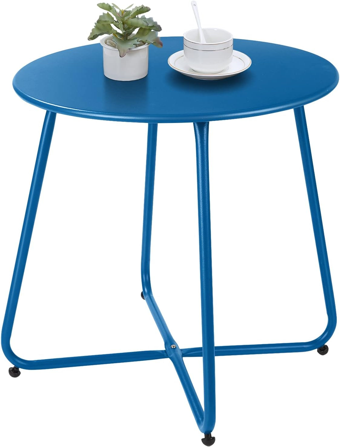Bright blue round metal side table with crossed tubular legs, small plant and teacup on top