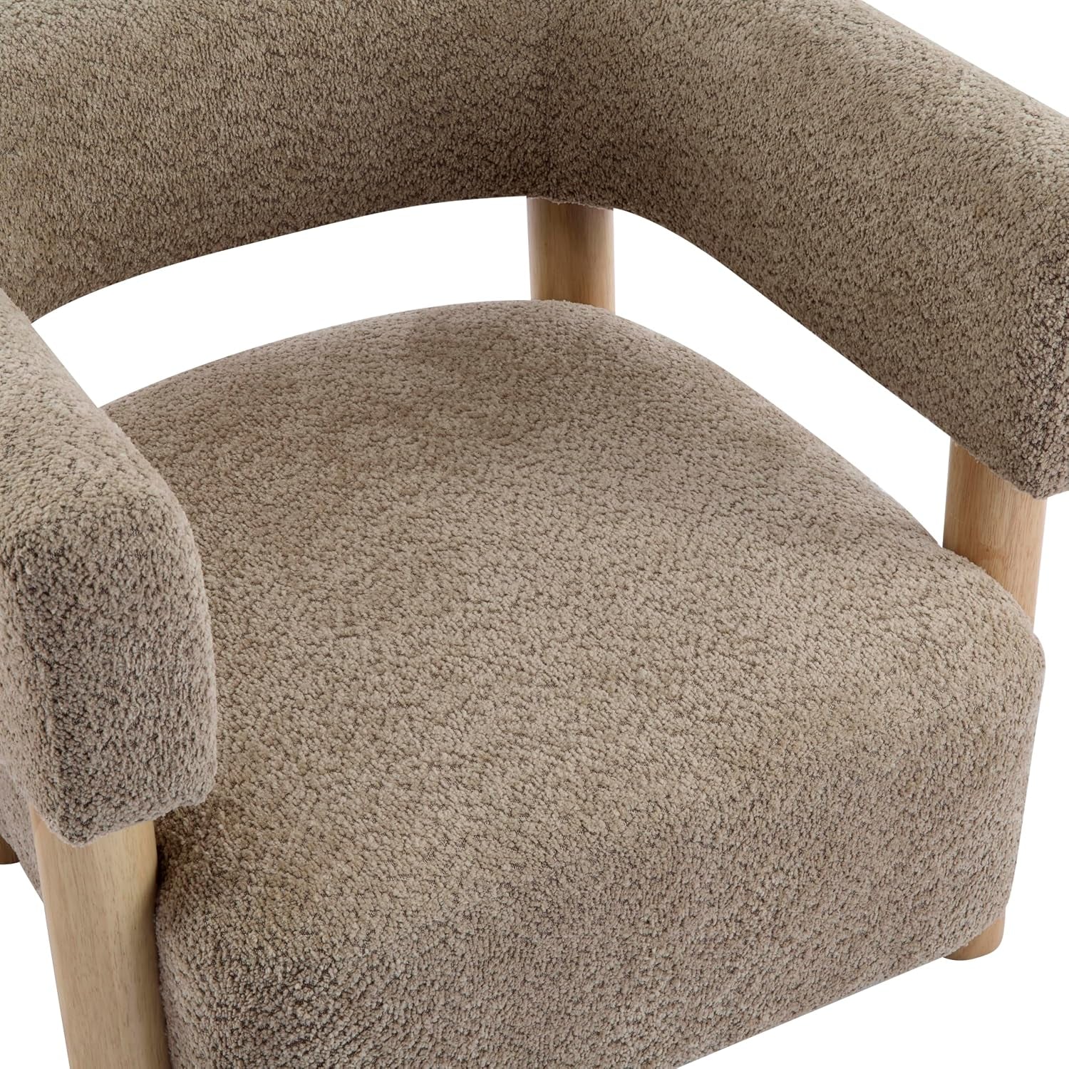 Close-up of the padded boucle seat and rounded light wood leg, showing texture and stitching-free seam