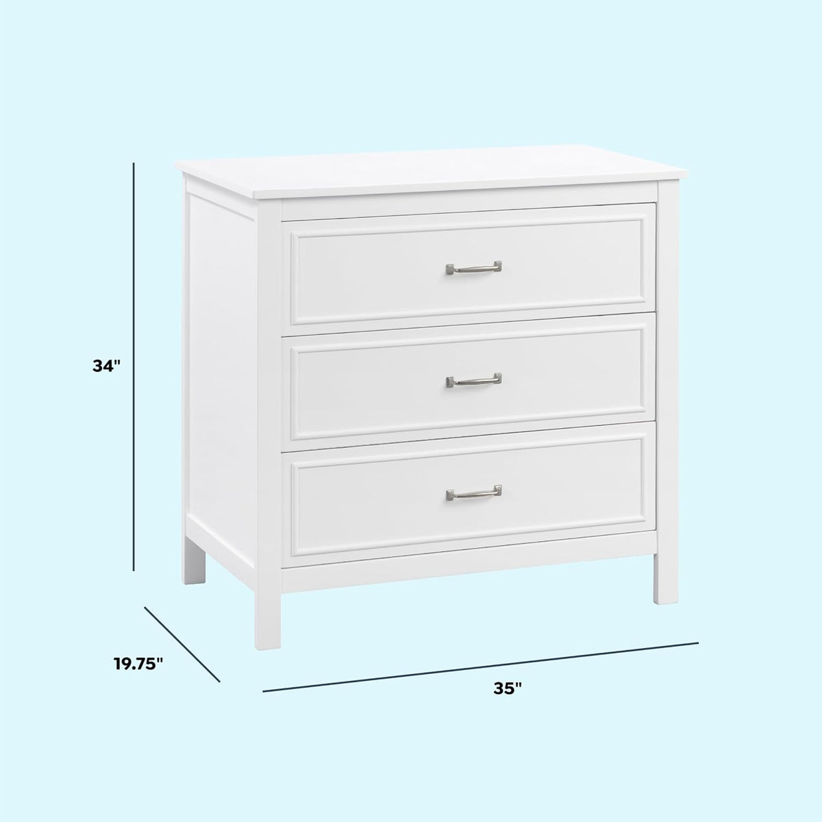 Angled left-front view of the white 3-drawer dresser on a pale blue background with measurement lines.